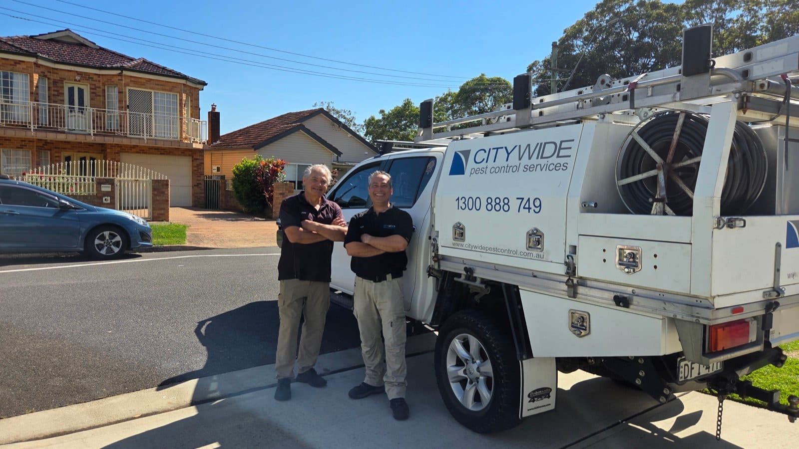 CITY WIDE technicians beside the company van